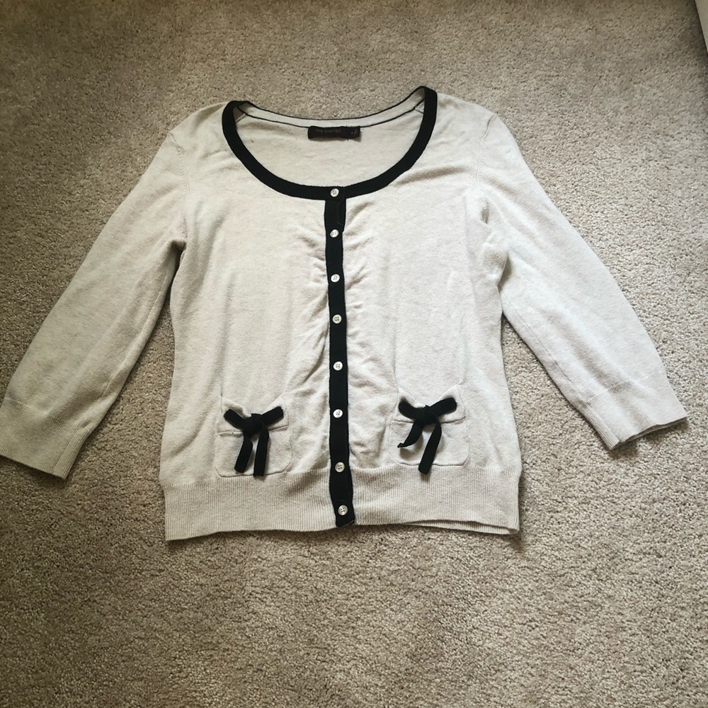 CREAM THE LIMITED CARDIGAN WITH BOW DETAIL